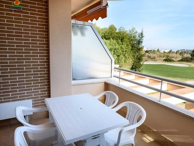 Venta de piso con piscina y terraza en Oliva, Oliva Nova Golf