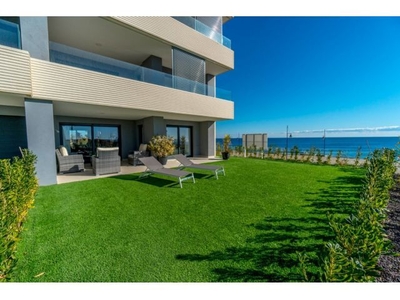 Apartamento planta baja con jardín y vistas al mar en Punta Prima!!!