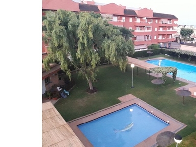 Piso en Chipiona con patio de 14 m2 y piscina comunitaria