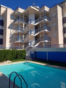 Alquiler de piso en Oliva Nova de 2 habitaciones con terraza y piscina