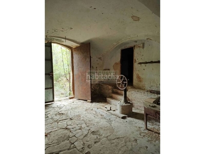 Casa antiguo molino harinero de tres plantas con terreno en el municipio en Jafre