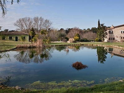 -Luxury villa with swimming pool tennis court and lake.