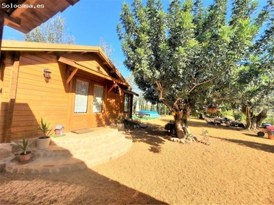 Casa de madera con gran parcela en el Campillo