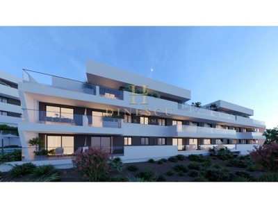 Apartamento moderno con cama individual con piscina comunitaria, terraza y