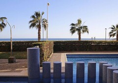 AT108 Stel: Apartment located on the first line of the sea with community garden and pool.