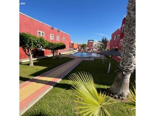 Estupendo apartamento en planta baja con jardin y piscina comunitaria