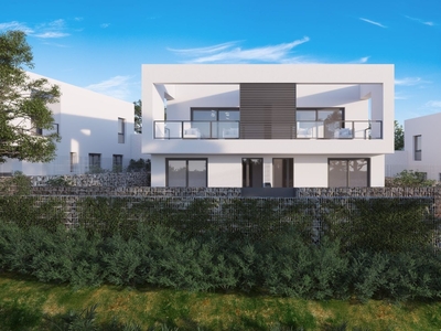 Gran casa pareada en un proyecto nuevo en Mijas