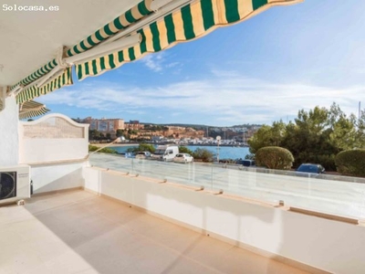 Encantador apartamento moderno en primera línea en Port Adriano con vistas al