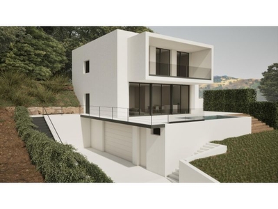 Exclusiva casa de obra nueva con jardín y piscina en venta en Vallromanes