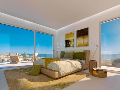 Casa adosada casa de tres dormitorios con espectaculares vistas al mar en Mijas