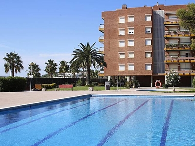 AT133 Els Pins I: Apartment located on the first line of the sea with 4 communal swimming pools.