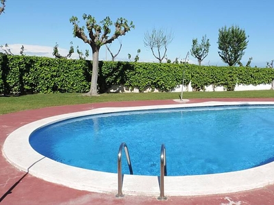 AT153 El Olivo: House with private garden that has a work barbecue and communal pool.