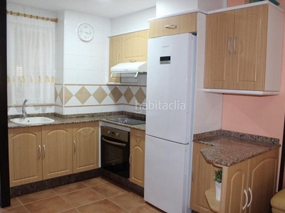 Apartamento seminuevo con piscina y vistas laterales al mar en Tavernes de la Valldigna