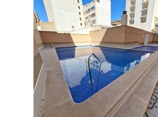 Apartamento céntrico, piscina comunitaria y garaje cerrado