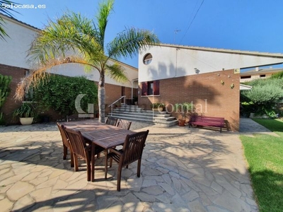 CASA EN UNA PLANTA CON JARDIN EN COSTA CUNIT