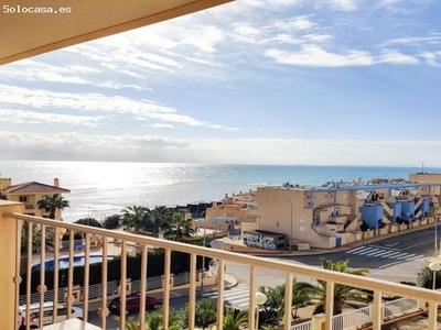 Apartamento de 2 dormitorios con vistas al mar, garaje, trastero y piscina comunitaria en Campoamor