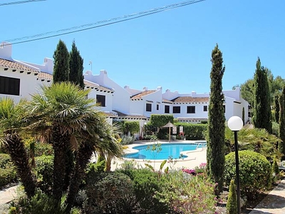 Townhouse in Cabo Roig, with community pool.