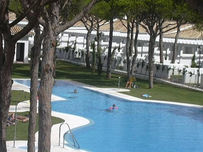 Adosado planta baja con piscina en la barrosa