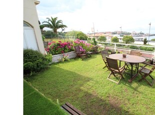 APARTAMENTO EN PLANTA BAJA CON JARDIN Y VISTAS AL MAR EN COMILLAS